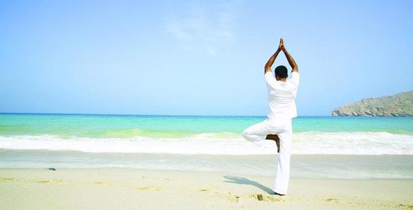 Yoga on the beach at Fusion Maia