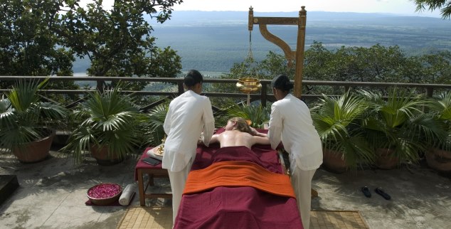 Woman receiving a massage at Ananda in the Himalayas, India