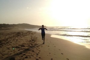 Person running on the beach