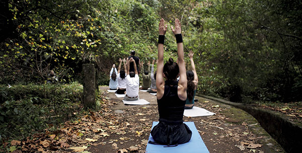 Group outdoor yoga class at Galo Resort in Madeira