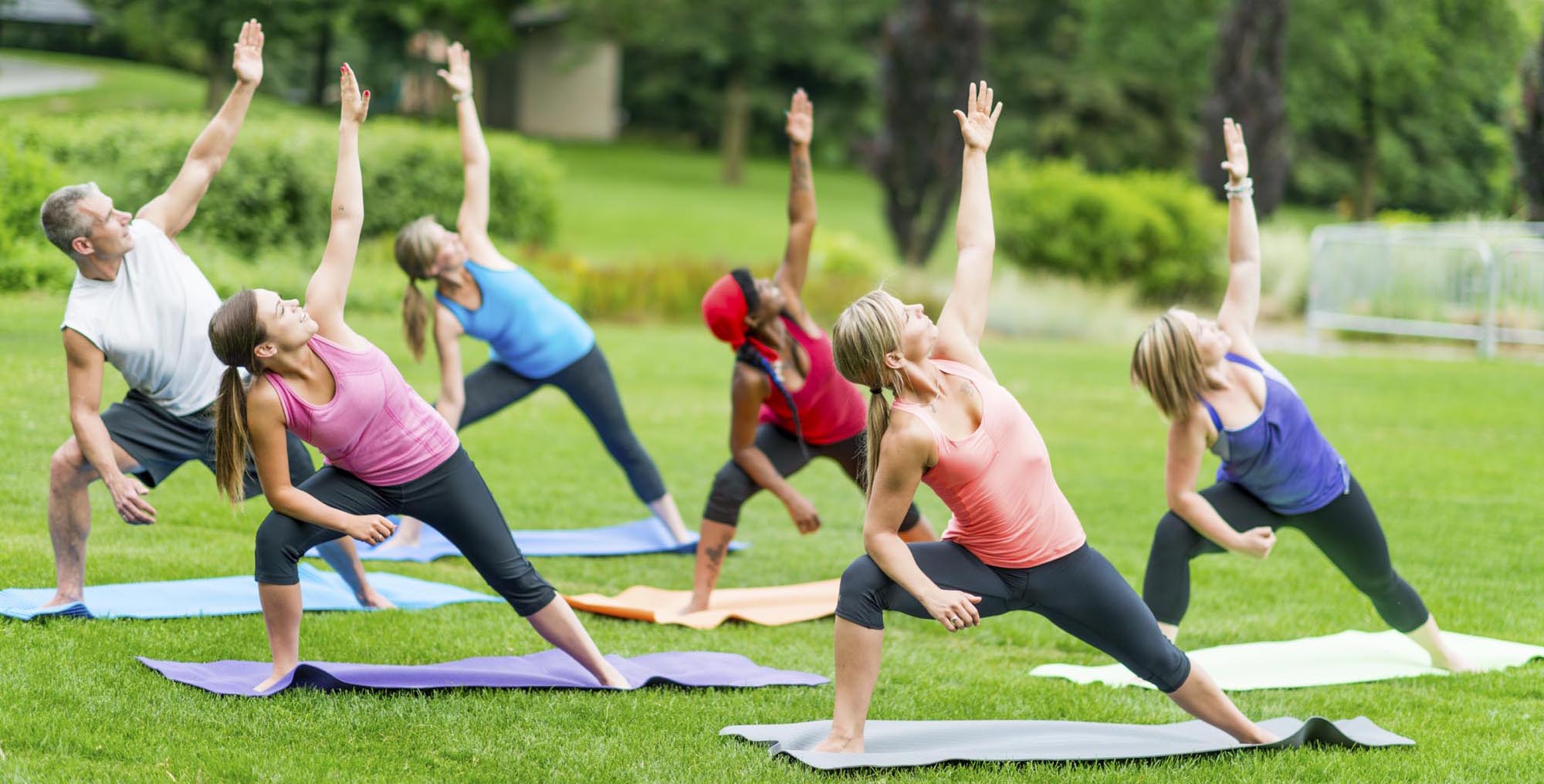 Group yoga class outside