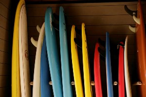 Colourful surfboards standing up at Paradis Plage in Morocco