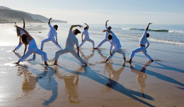 Yoga on the beach at Paradis Plage