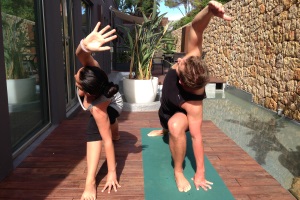 Paul practising yoga with teacher Ayda Ellis at Aguas de Ibiza