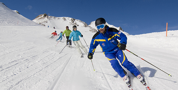 Skiing through snow-topped mountains