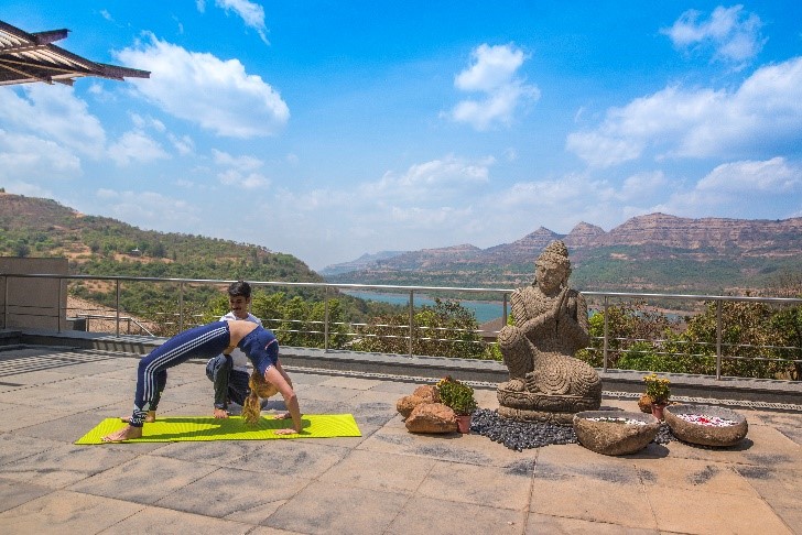 Woman practicing yoga at Atmantan Wellness Resort