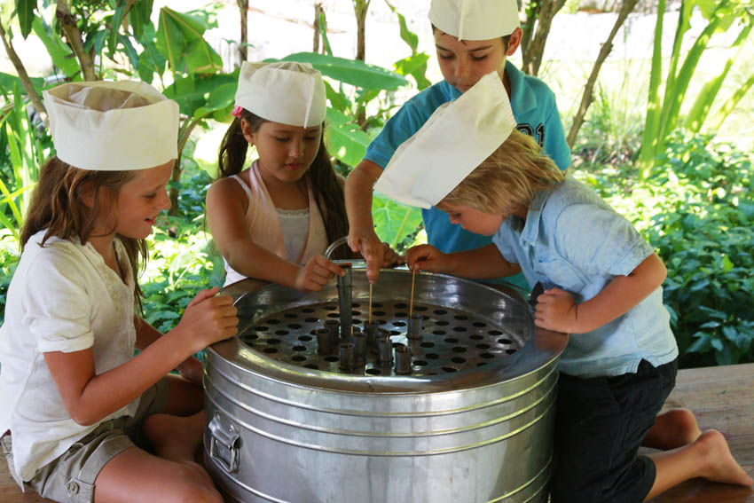 Family cooking at Soneva Kiri