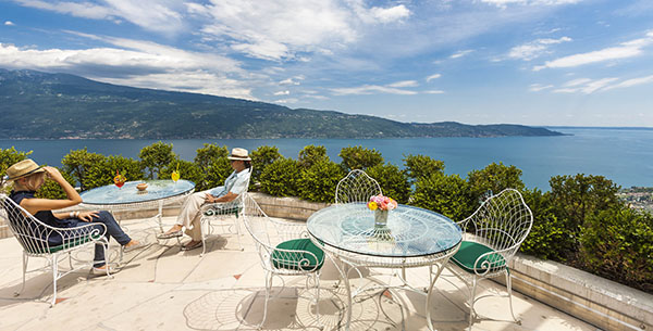 Enjoy a relaxing cocktail with a view at Lefay in Italy on your couple's wellness retreat