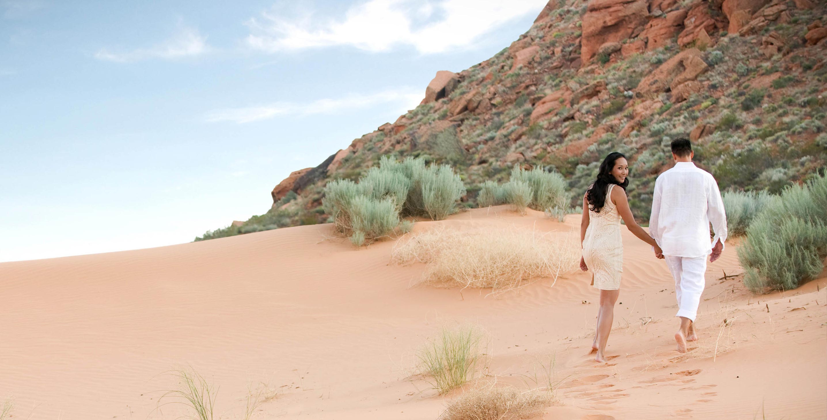 couple on red sands of red mountain