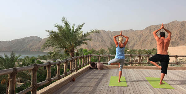 De-stress at the luxurious Zighy Bay in Oman with open air yoga with your partner