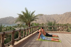 Zighy bay yoga class resort view