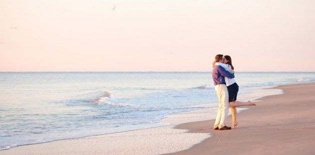 Couple Beach Hugging Blog Header