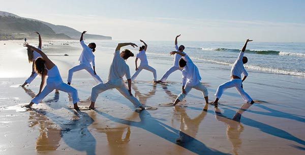 A yoga class on the beach at Paradis Plage 