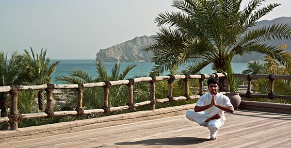 Yoga on the pavillion at Zighy Bay