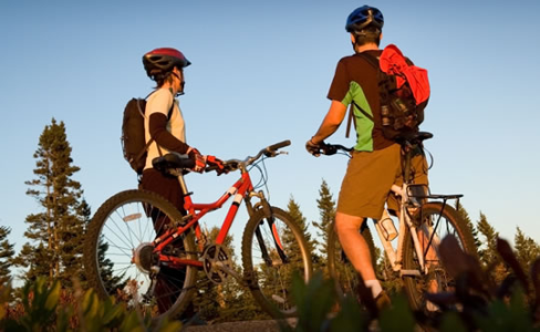 Two men mountain biking in the countryside Two men mountain biking in the countryside