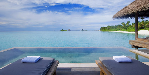 Beach sunrise private villa Maalifushi by COMO