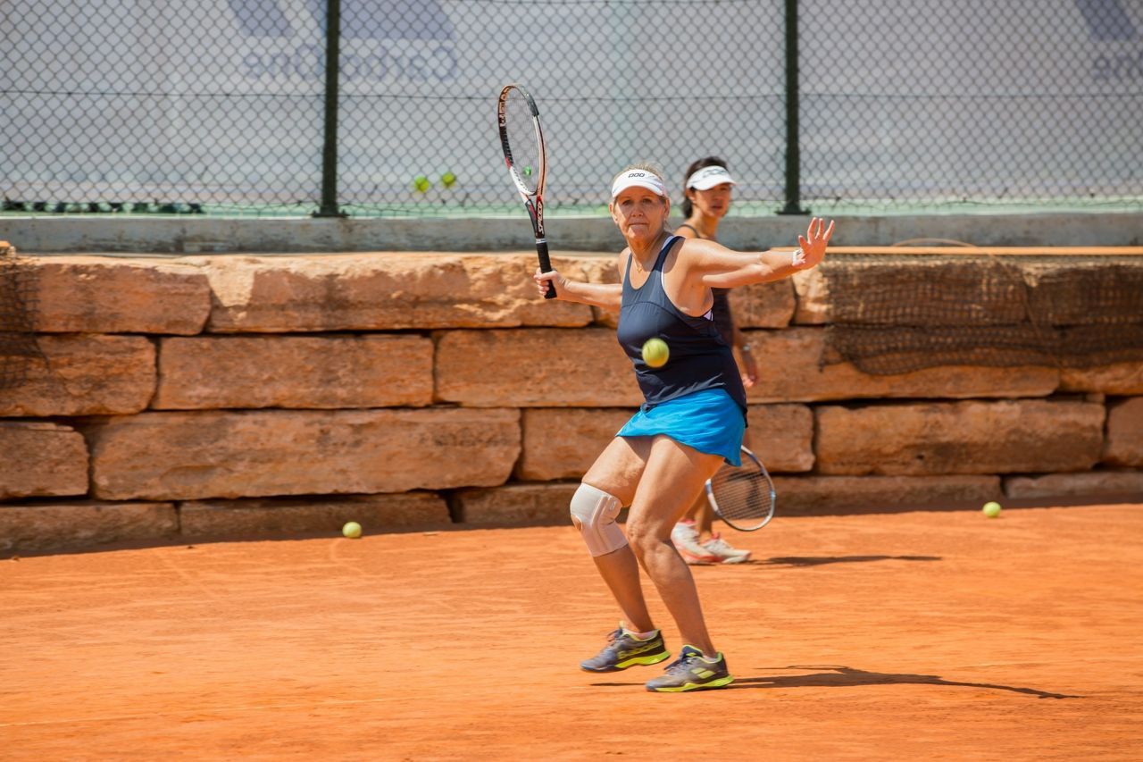 Playing tennis at Aphrodite Hills in Cyprus