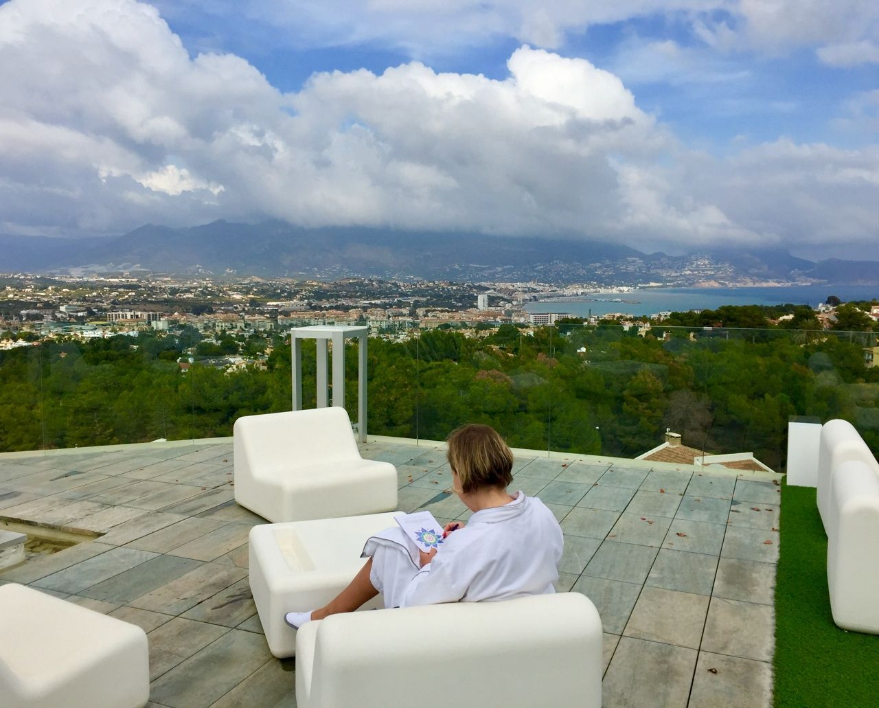 Claudia relaxing outdoors at SHA Wellness Clinic
