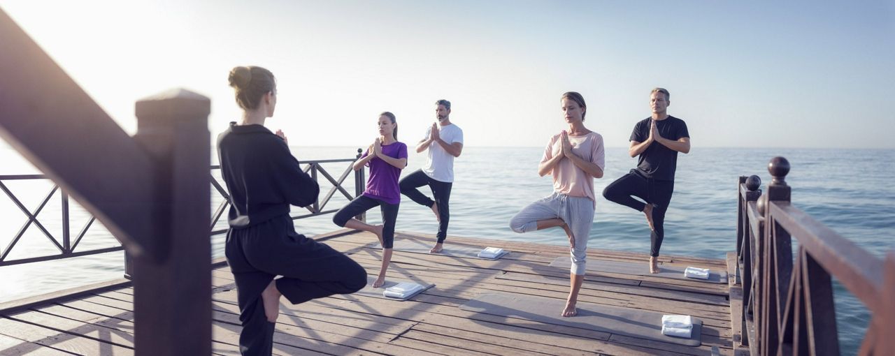 Group yoga class at Marbella Club