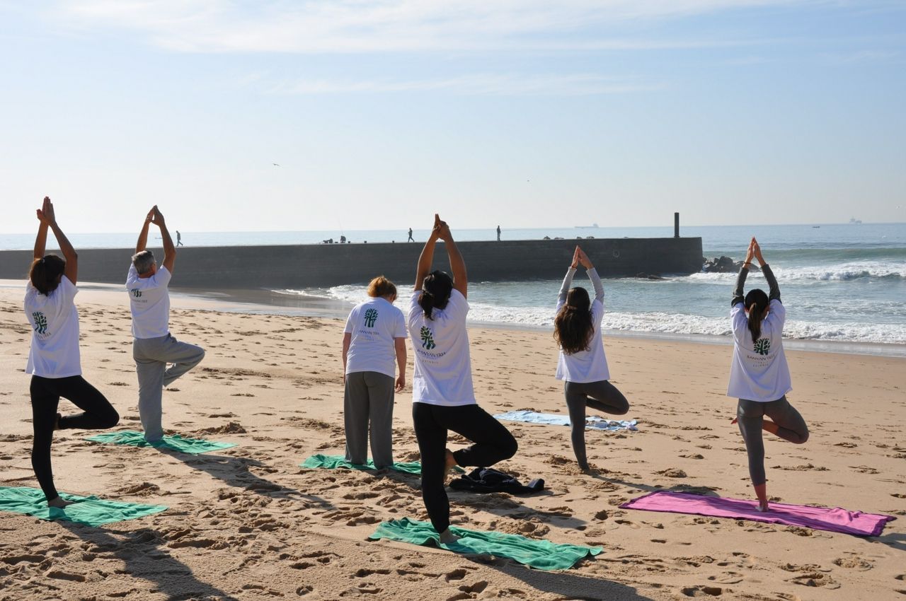 Group beach yoga at Palacio Estoril Golf and Spa Hotel