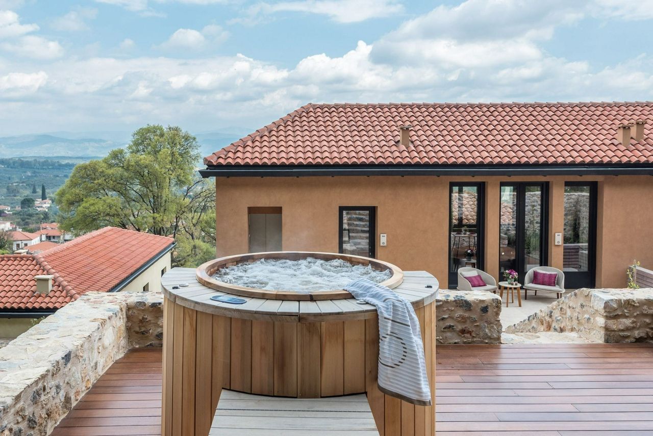 Outdoor hub tub at Euphoria Retreat in Greece Outdoor hub tub at Euphoria Retreat in Greece