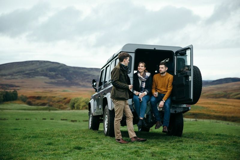 Group in a jeep, ready for a hike in Scotland