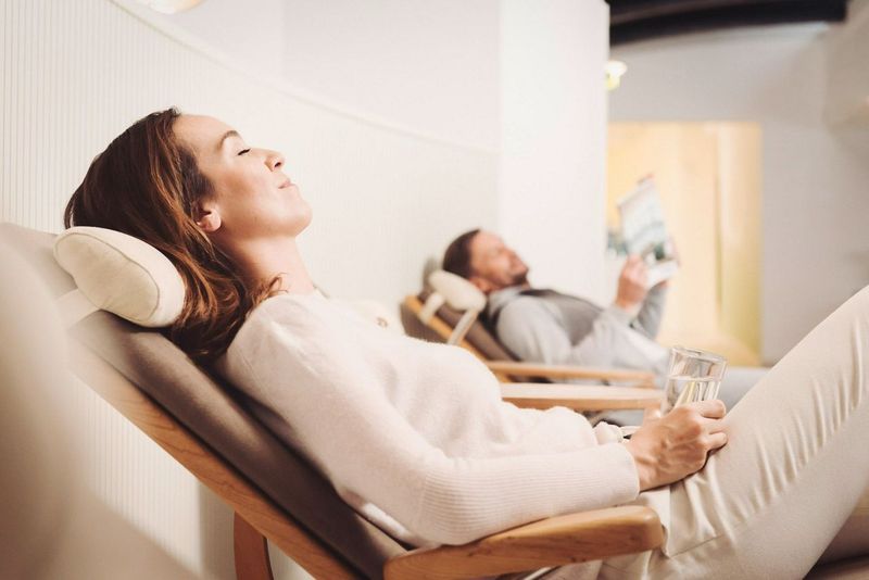 Couple relaxing on loungers at Park Iglis