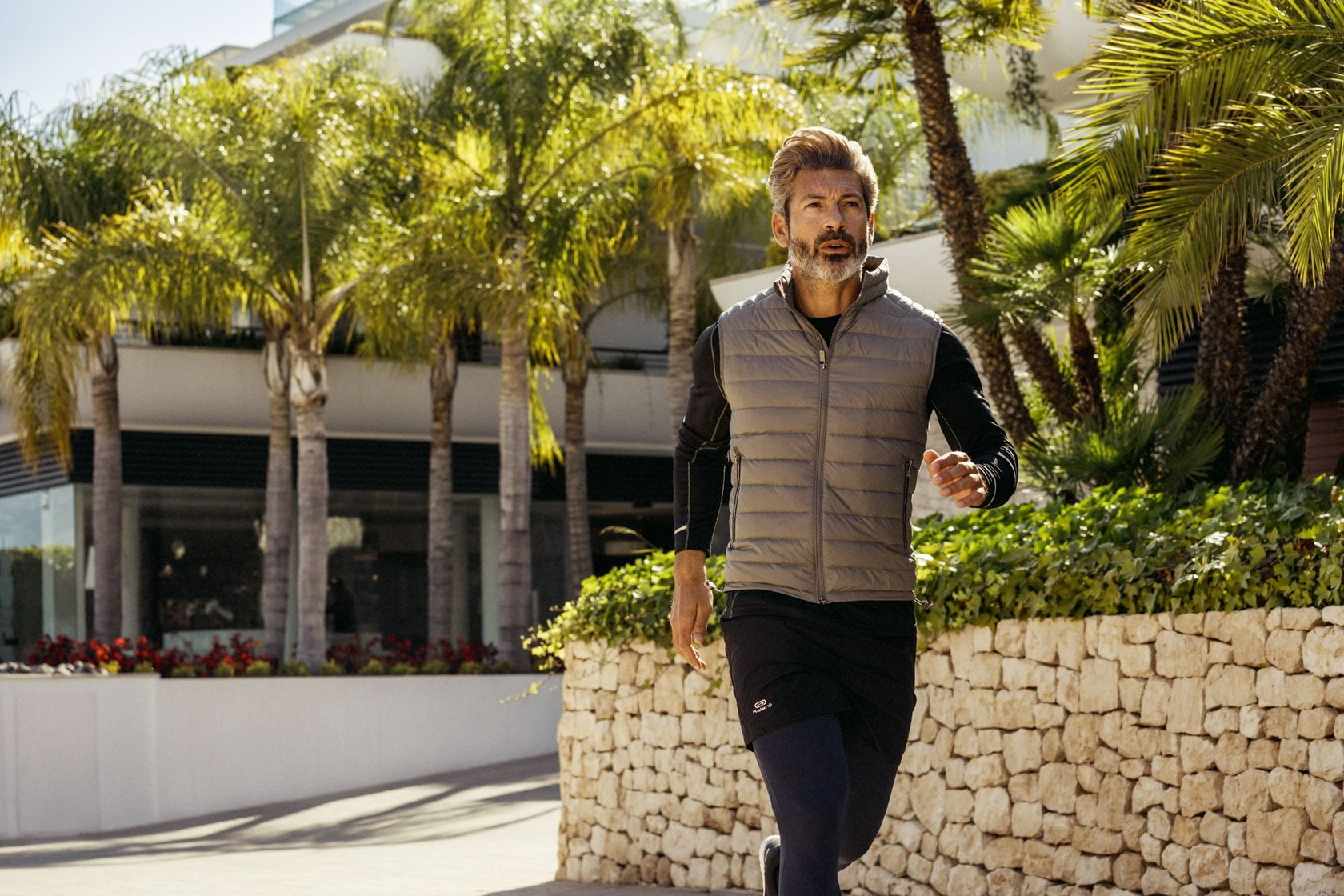 man running around SHA Wellness site on a health retreat