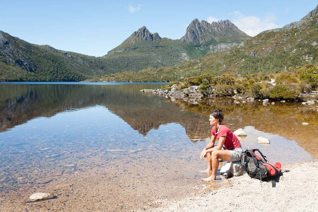 Hiker by lake in Australia