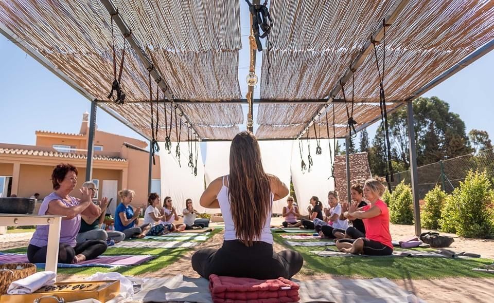 Group yoga class at Alamos Retreat in Portugal