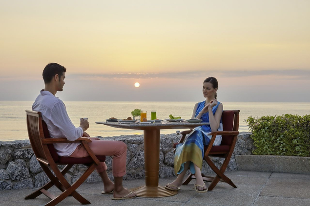 Couple outside dining at Chiva Som