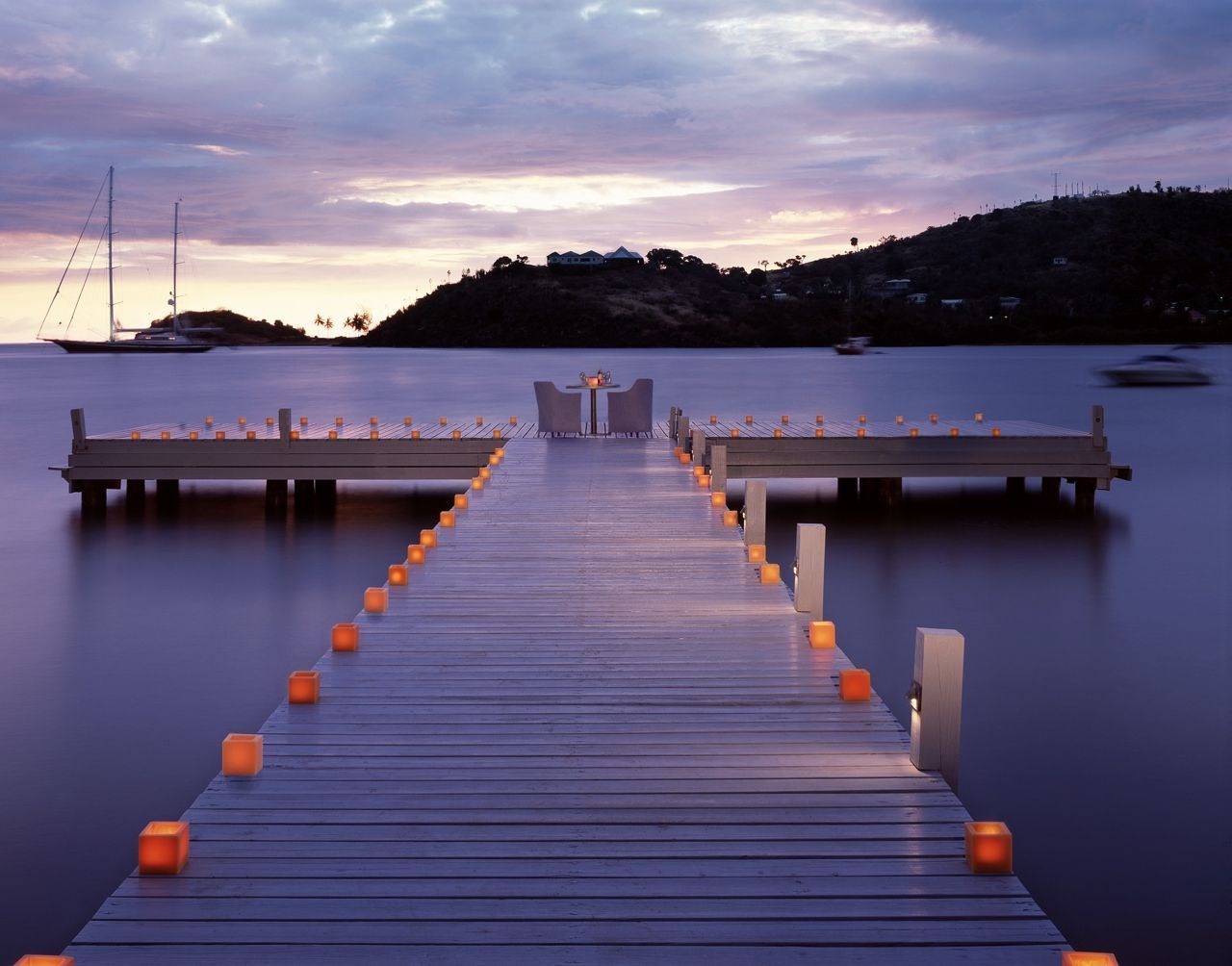 Candles on a promenade at Carlisle Bay in Antigua, the perfect wellness resort for Christmas and New Year Candles on a promenade at Carlisle Bay in Antigua, the perfect wellness resort for Christmas and New Year