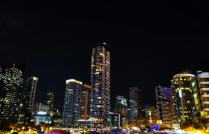 Stunning night view of the Dubai Marina skyline with illuminated skyscrapers reflecting urban vibrancy.